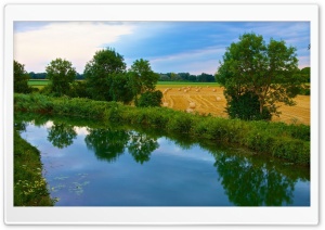 Green river near the field Ultra HD Wallpaper for 4K UHD Widescreen desktop, tablet & smartphone