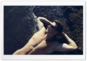 Man Sunbathing On Beach Ultra HD Wallpaper for 4K UHD Widescreen desktop, tablet & smartphone