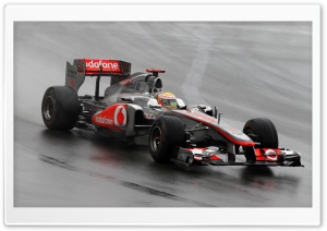F1 Car On A Wet Track Ultra HD Wallpaper for 4K UHD Widescreen desktop, tablet & smartphone