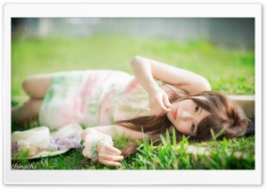 Girl Lying on the Grass Ultra HD Wallpaper for 4K UHD Widescreen desktop, tablet & smartphone