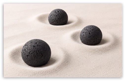 Minimalist Black Lava Stones in Fine Sand UltraHD Wallpaper for UHD 16:9 ; HD 16:9 ; Widescreen 16:10 ;